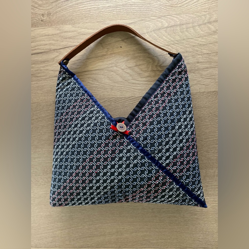 Hand made hand embroidered origami handbag